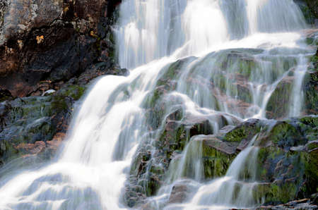 Beautiful and mystic waterfall taken with long exposure timeの写真素材