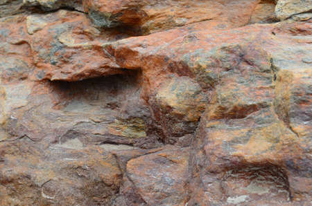 colourful mineral rock cliff side