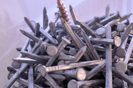 Pile of Nails and Screws macro photoの写真素材