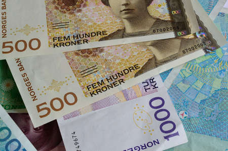 Pile of Norwegian paper money currency close up