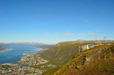 Mountain lift cable cart in Tromsdalen, Tromsoe going up the mountain