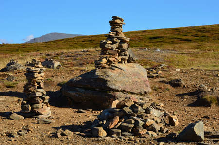 stone cairn on a mountain in Tromso