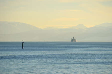 coastguard ship in the distance