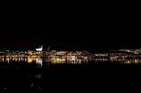 vivid and bright tromsoe city island at night timeの写真素材