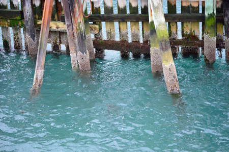 colourful pier and blue sea waterの写真素材