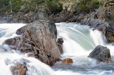 rapid waterfall in small salmon river in summerの写真素材