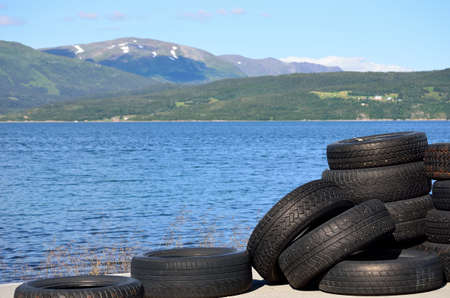 sea shore in summer with tires in front