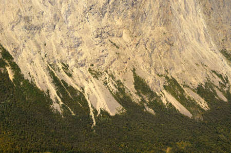steep mountain side and rock slideの写真素材