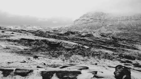 New snow and white mountain landscape in late autumn in the arctic circleの素材