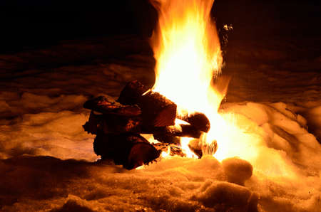 massive fire in winter snowy natureの写真素材