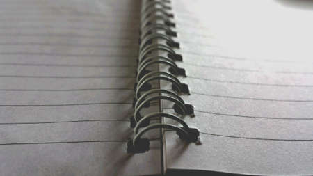 White note pad paper with spiral spine