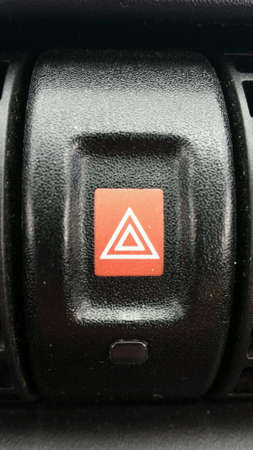 Car emergency hazard button red