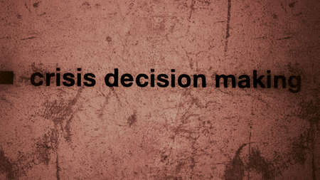 Crisis decision making text on paperの素材