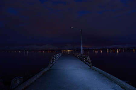 long pier at nightの写真素材