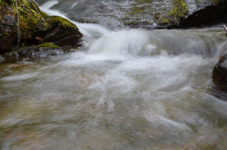 beautiful summer mountain creek water flow