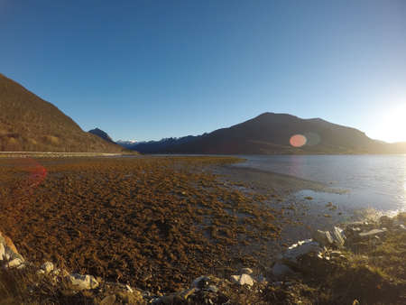 sunny sea, shore and mountains in northern norway