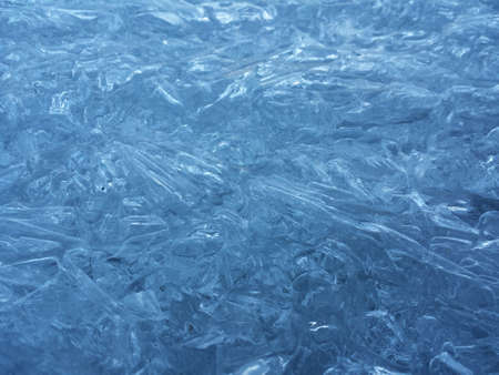 beautiful fresh water blue ice background in northern wildernessの写真素材