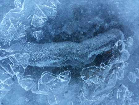 beautiful fresh water blue ice background in northern wildernessの写真素材