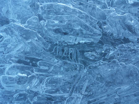 beautiful fresh water blue ice background in northern wildernessの写真素材