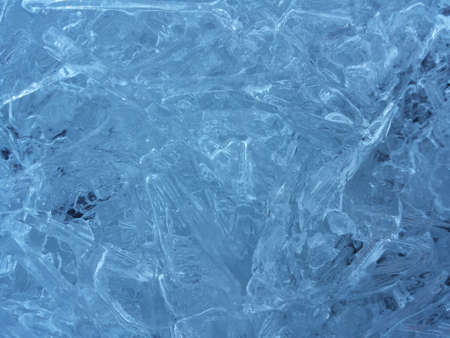 beautiful fresh water blue ice background in northern wildernessの写真素材