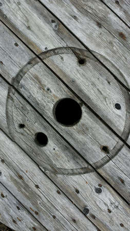 Round wooden manhole cover