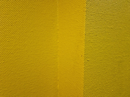 Yellow fabric texture background. Close up of yellow fabric texture background.の写真素材