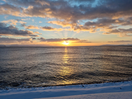 Sunset over the sea in winter northern norwayの写真素材