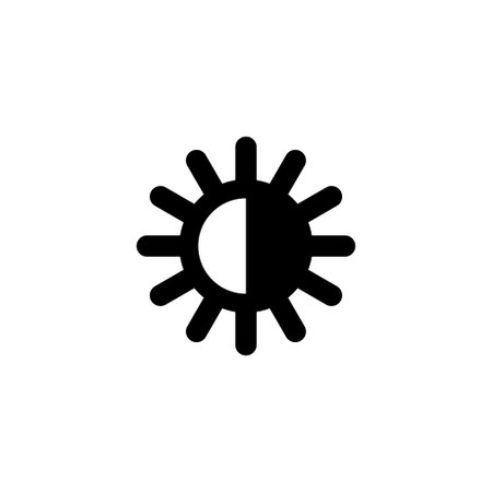 Black and white brightness control icon with sun and rays.のイラスト素材