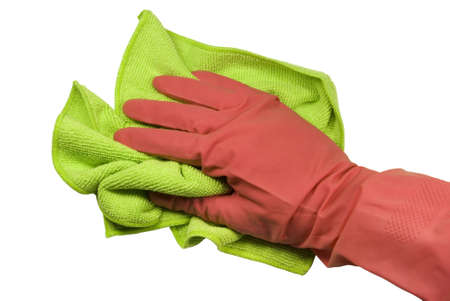 Hand in a pink rubber glove and a green rag. On a white background