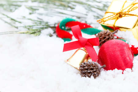 Christmas decoration on snow background.の写真素材