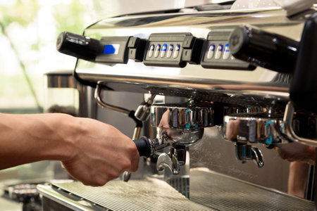Coffee machine close-up. Barista preparing coffee in coffee shopの写真素材
