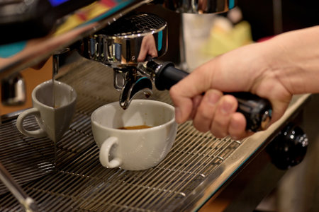 Close up barista hand making coffee by coffee machine.の写真素材