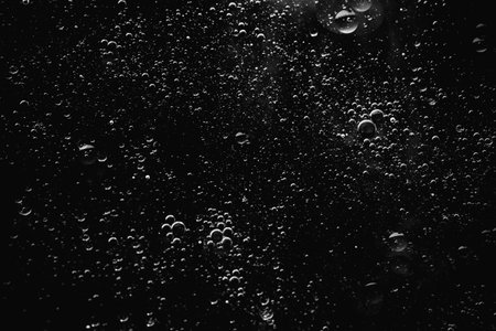 Air bubbles in the water background.Abstract oxygen bubbles in the sea.Water bubbles isolate on...