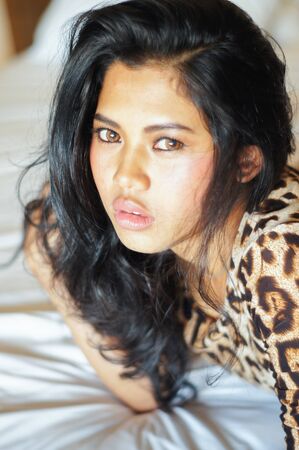 asia sexy women. she have tan skin and long hairの写真素材