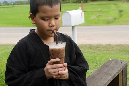 boy are drinking ice chocolateの写真素材