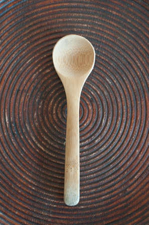 wooden spoon on wooden tableの写真素材