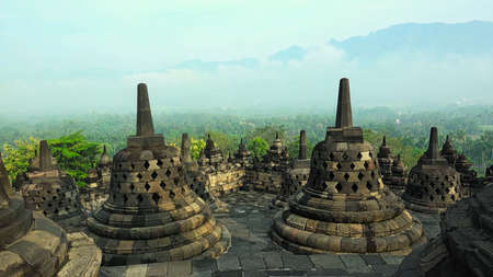 Nice view of Borobudur temple with green environment, this is the largest Buddhist temple in the world, and able to attract millions of tourists every yearの写真素材