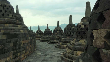 Borobudur temple with nice cloudy sky, this is the largest Buddhist temple in the world, and able to attract millions of tourists every yearの写真素材