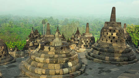 Amazing Borobudur temple with green environment, this is the largest Buddhist temple in the world, and able to attract millions of tourists every yearの写真素材