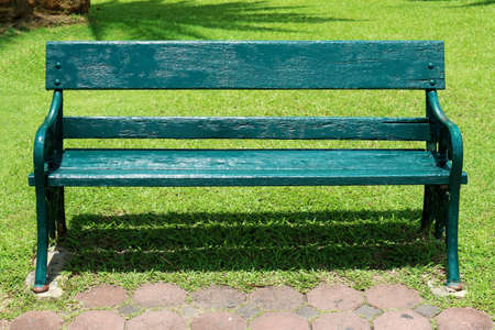 Rustic Outdoor Wooden Bench in the Parkの写真素材