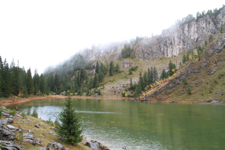 Small pond in foggy day in Rugova valley, Kosovoの写真素材