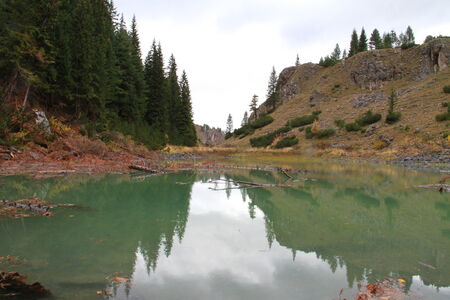 Pine reflection in the lake in Rugova, Kosovoの写真素材