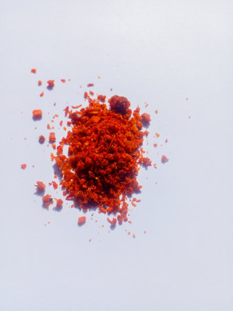 Red chili powder isolated on white background. Chili powder for food.の写真素材