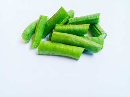 Slices of long beans isolated on white background. Green vegetables.の写真素材