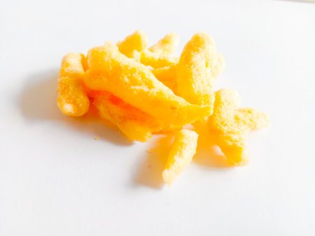 Corn snacks isolated on white background. Delicious children's favorite snacks.の写真素材