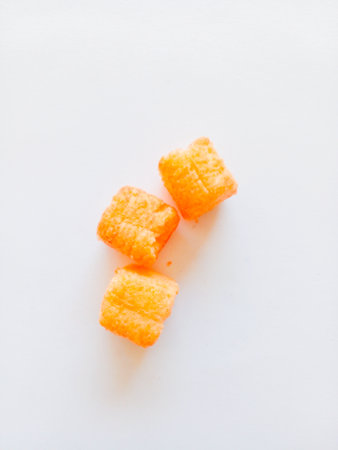 Corn snack isolated on white background. Delicious and crunchy corn snack.の写真素材