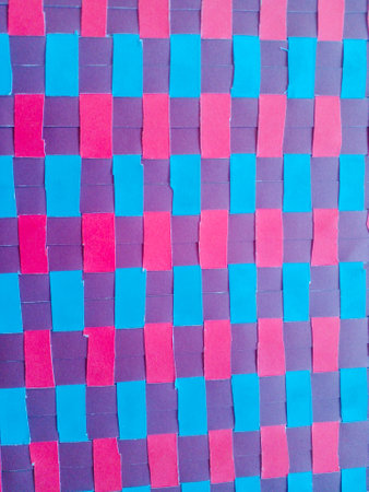 Woven paper with beautiful patterns. Woven paper in brown, red and blue colors.