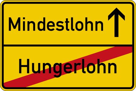 The German words for pittance and minimum wages (Hungerlohn and Mindestlohn) on a road signの写真素材