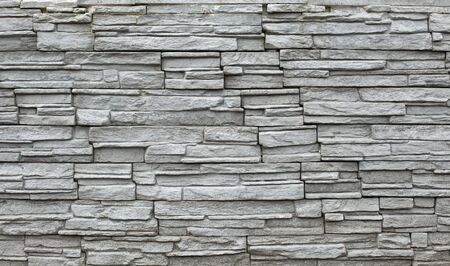 Close up of a grey stone wallの写真素材
