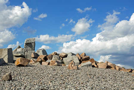 Granite and sandstone photographed against the cloudy skyの写真素材